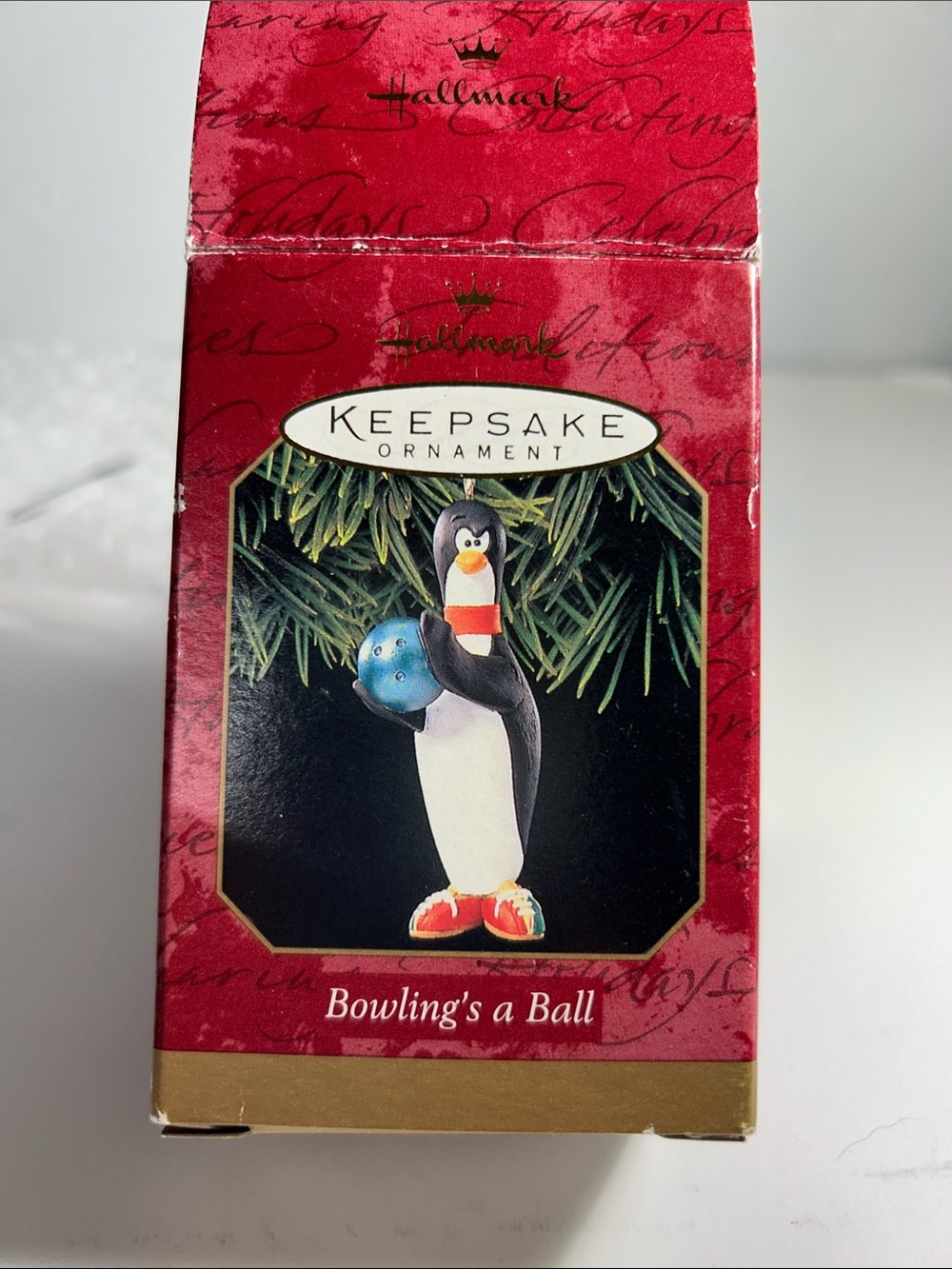 Hallmark Penguin Ornament with Blue Bowling Ball and Red Accents